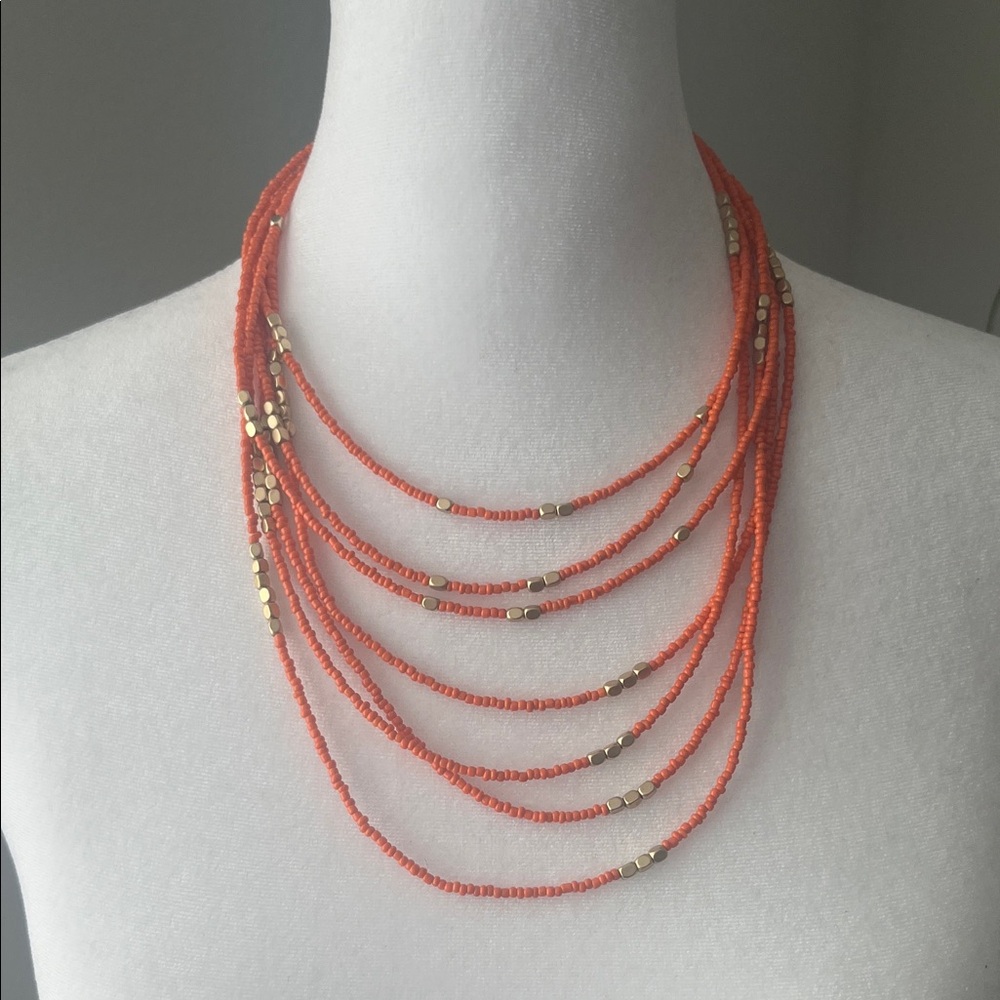 Multi-strand Orange Beaded Necklace with gold accents
